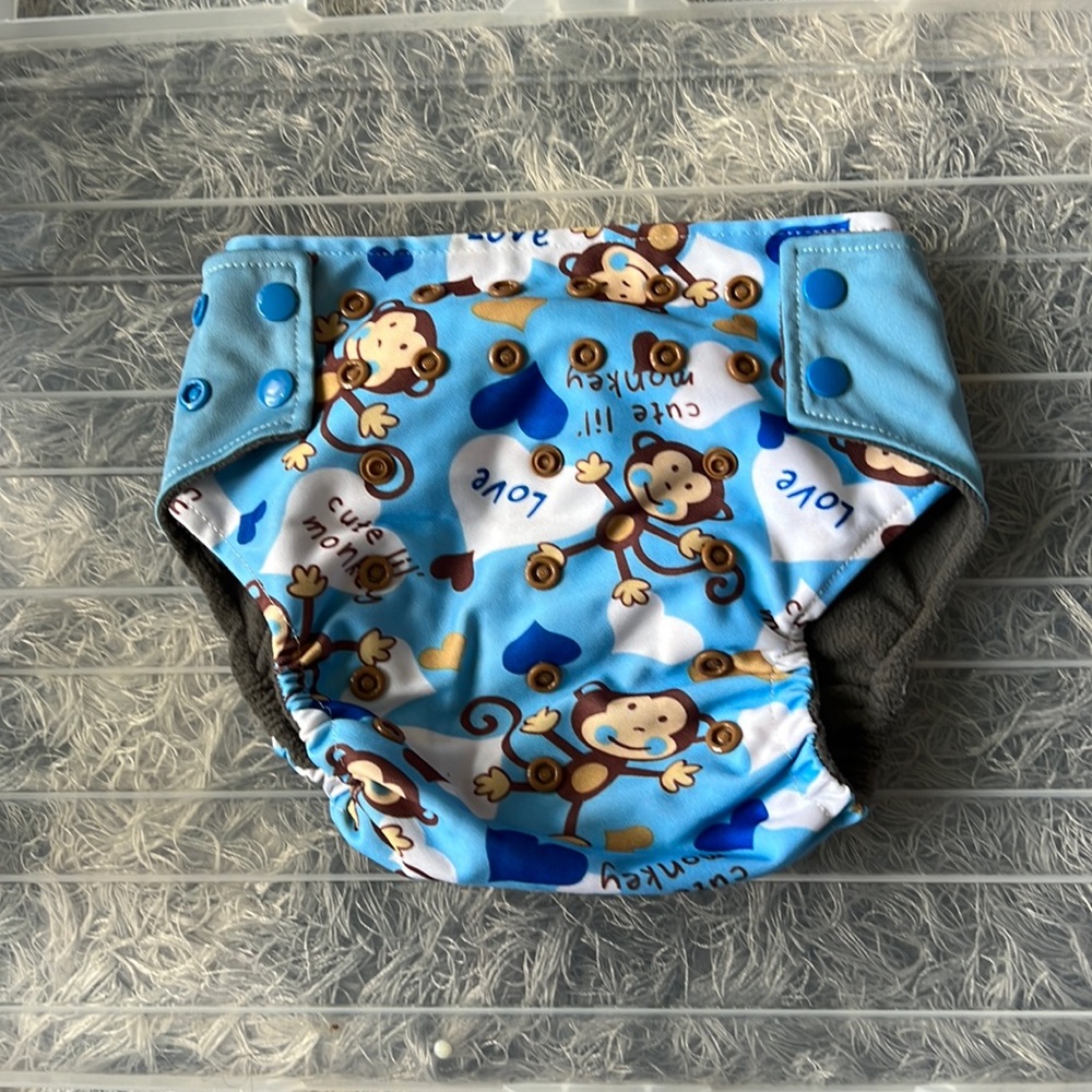 Cute Lil’ monkey reusable, washable diapers with inside pocket